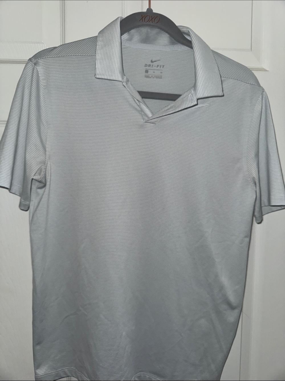 Nike women’s  Dri-FIT Light Gray and white stripe Polo Shirt